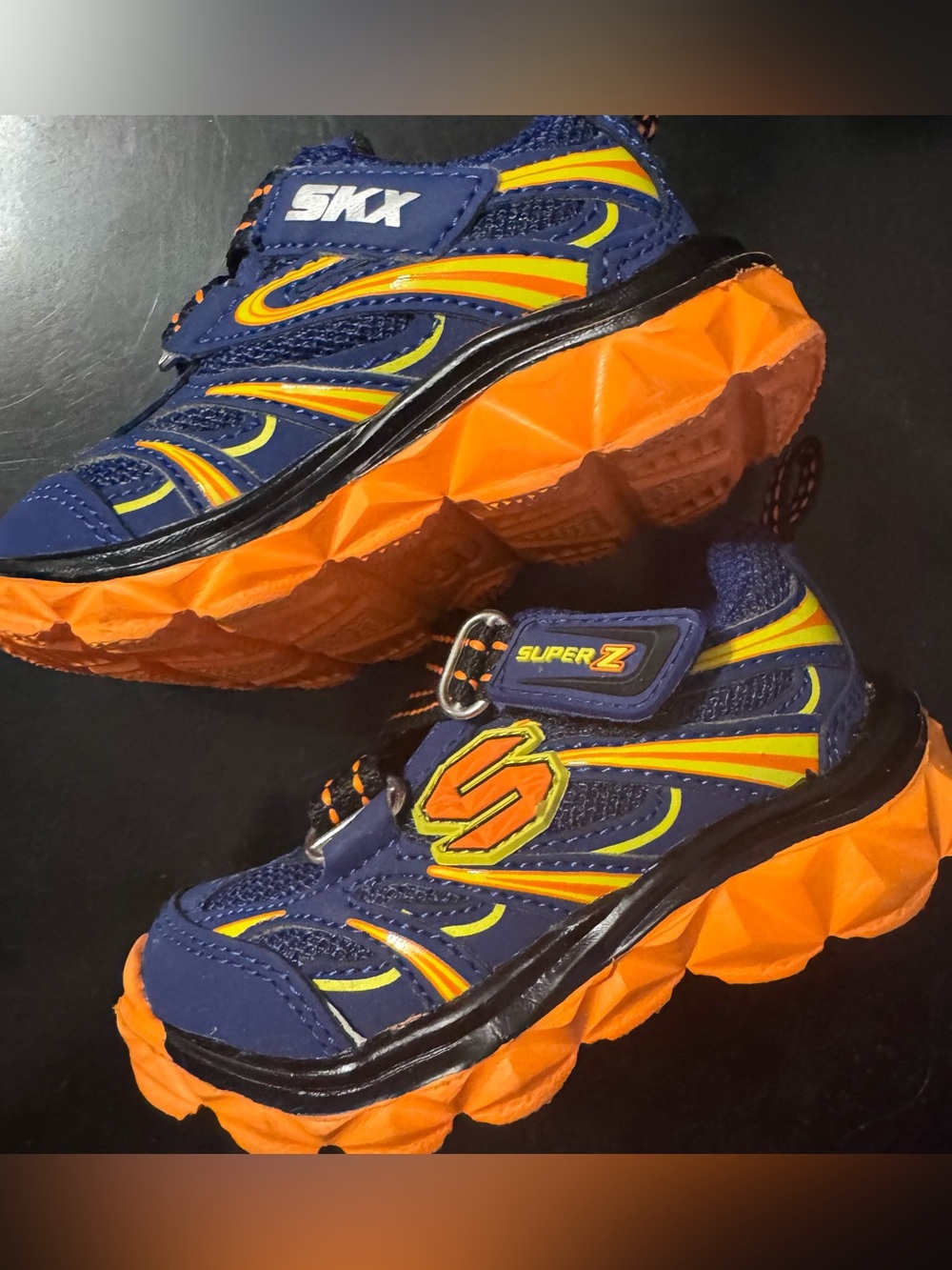 Toddler blue and orange Skechers sneakers size 5